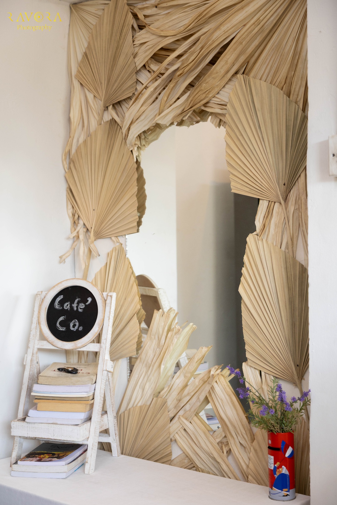 Dried palm leaf wall with our Cafe' Co. chalkboard
